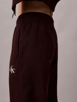 Calvin Klein Jeans naisten collegehousut Monology French Terry Jogger, tummanruskea
